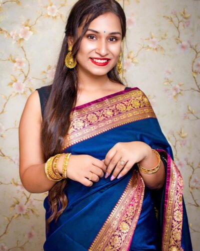 Blue Banarasi satin silk saree with all over embroidery and Resham work