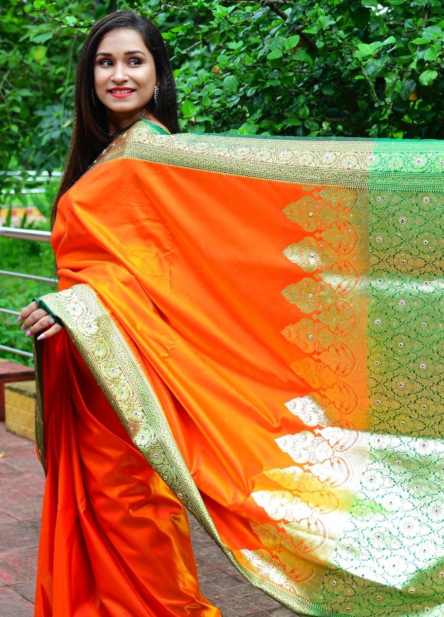 Orange Banarasi satin silk saree with all over embroidery and Resham work